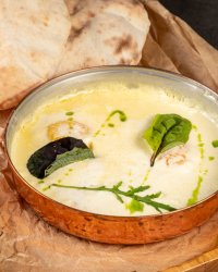 Яичница в сметанном соусе