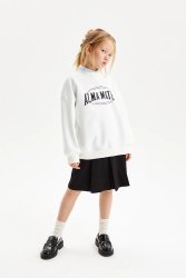 Свитшот молочного цвета с принтом "Alma mater", из хлопкового футера.